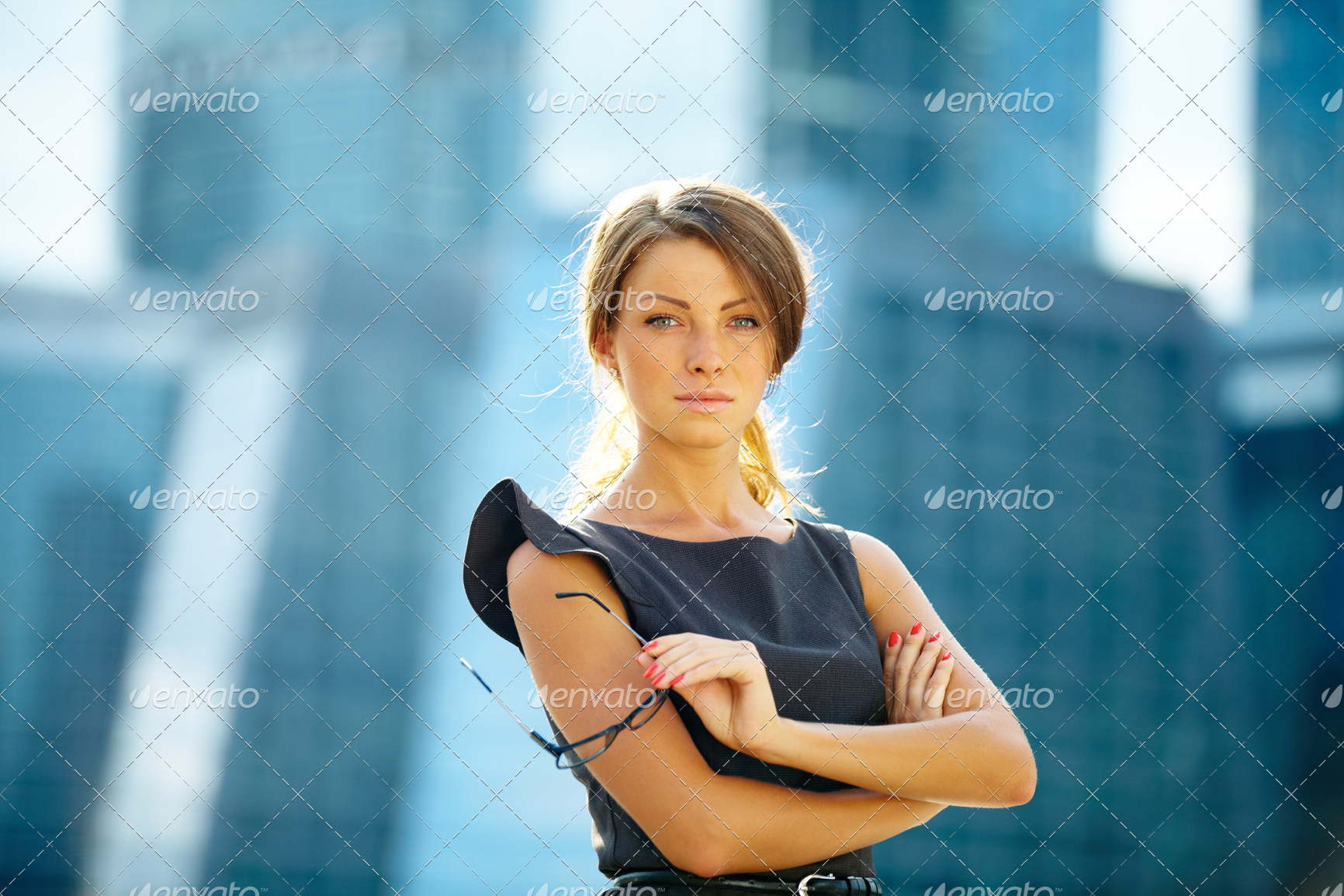 young businesswoman over office background